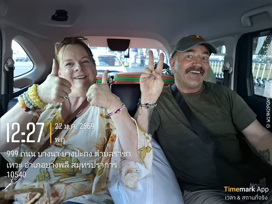 Two guests in a WayGo car on the way to Suvarnabhumi, Samut Prakan.